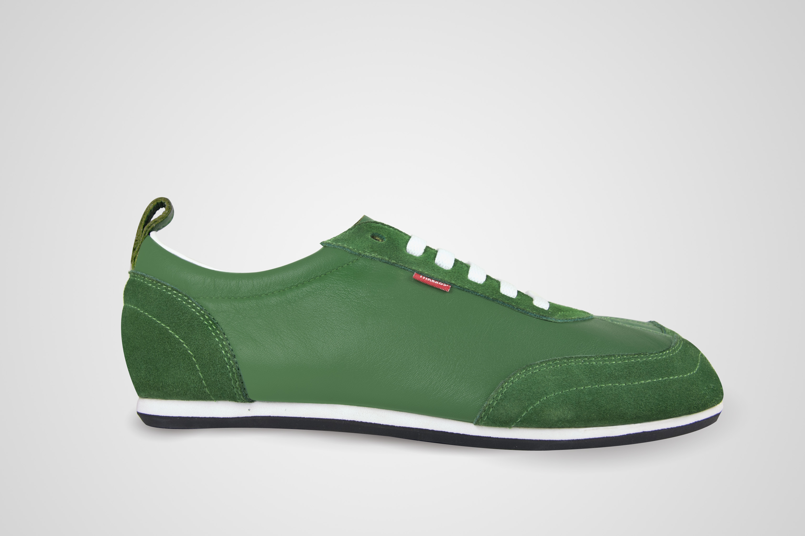 Original green TABI shoe from the side, original photograph